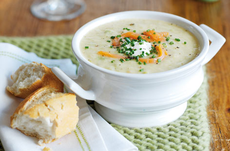 Add a touch of luxury to classic leek and potato soup, with the addition of smoked salmon and crème fraîche: the salmon brings a lovely smoky touch.  Make a large batch of it and freeze a few portions to enjoy at a later date.