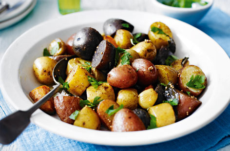 Add a burst of autumn colour to your Sunday roast with this medley of rustic rainbow potatoes