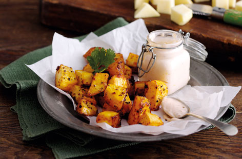 This harissa roasted swede is a useful winter side dish for serving alongside grilled meat. Spicy and crisp in places, serve with creamy greek yoghurt mixed with extra harissa for an additional spice kick.