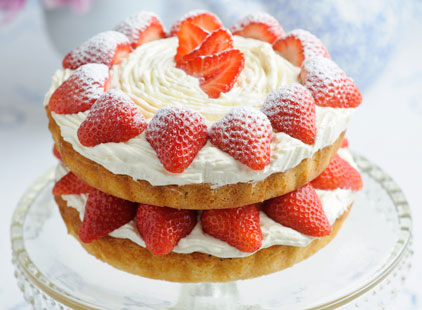 Master the classics with this delicious Victoria sponge. A quintessential British bake, it features layers of light sponge sandwiched together by velvety cream and juicy strawberries