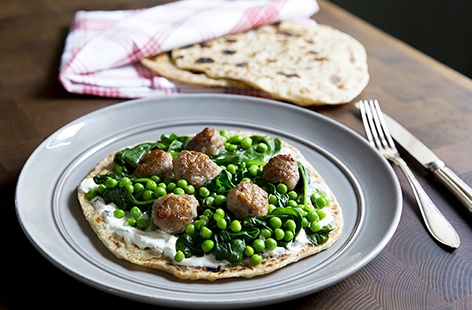 You can rustle up this tasty meatball and flatbread dish using the same ingredients as a classic toad-in-the-hole
