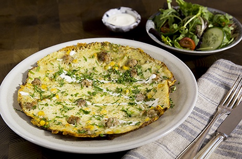 This pancake dish is packed with succulent sausages and sweetcorn for a truly scrumptious savoury dish