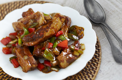 Sweet and sticky, these soy, sugar and sherry-marinaded pork spare ribs fall off the bone to form the centrepiece of a homemade Chinese supper. Serve with white rice and prawn crackers for a night out without leaving your house.