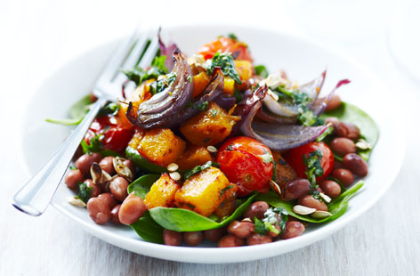 Butternut squash, sprinkled with spices and roasted in the oven is an ideal winter salad ingredient. Add some cherry tomatoes and onions part way through cooking as with this recipe, and the results, tossed together with some borlotti beans in a salad will have mouths watering.