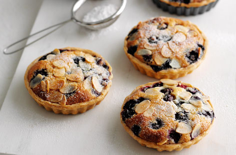 Cheat and make these moreish almondy tarts with readymade pastry, don’t tell your friends and they won’t guess!