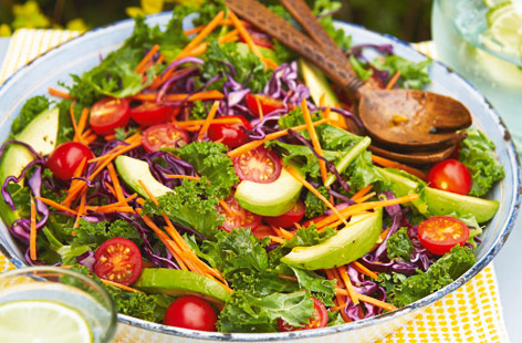 Kale, a mainstay of Braziian cuisine, makes a great base for a colourful salad
