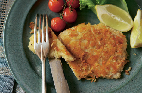 Try making your own cheesy crispy schnitzels using this recipe featuring turkey breast, emmental and breadcrumbs. A light dinner dish, it's served alongside bursting, roasted cherry tomatoes and lightly dressed green leaves.
