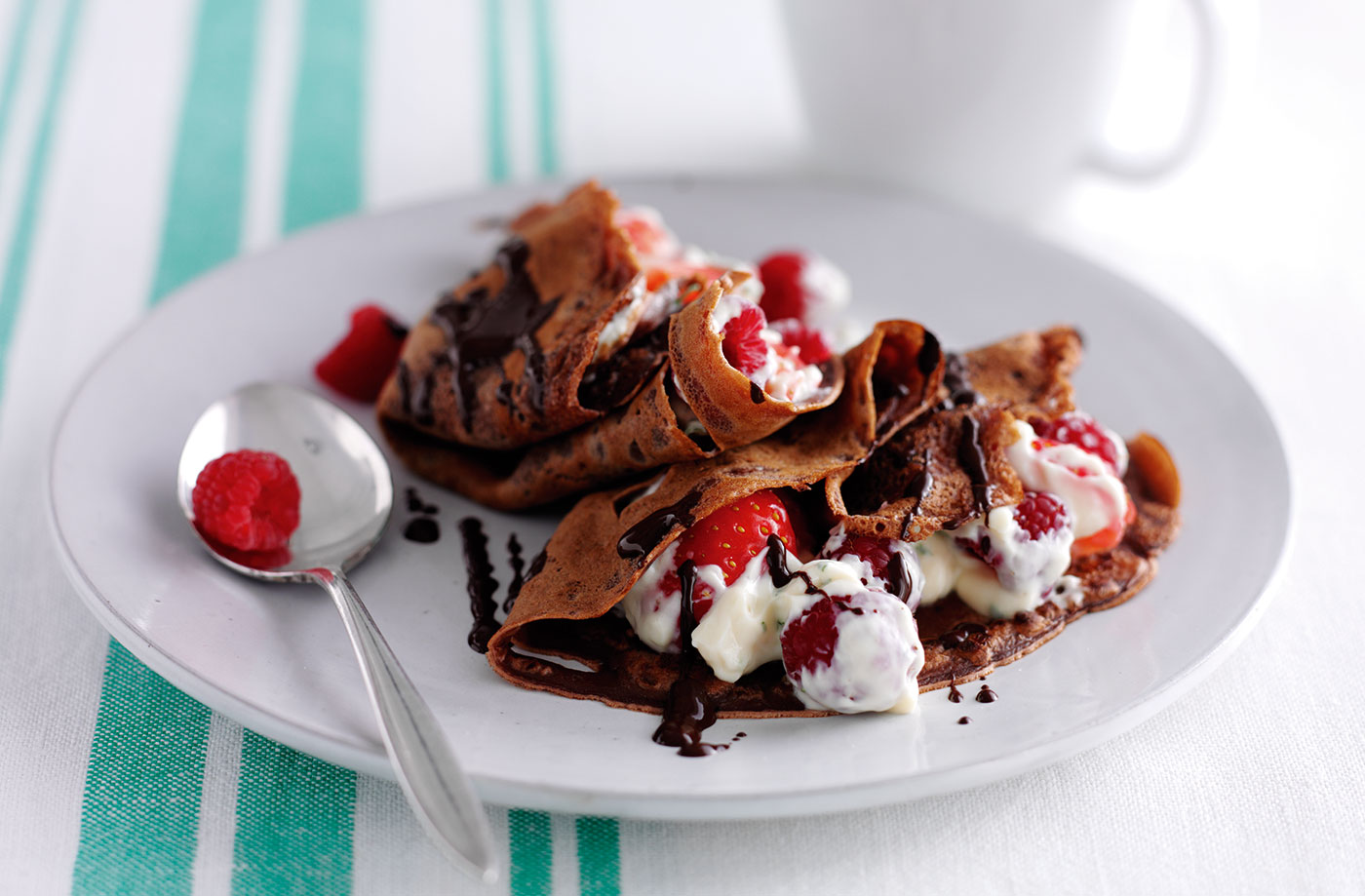 Chocolate pancakes with berries and yogurt recipe