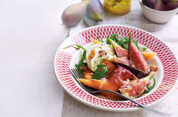 Italy on a plate, this marinated fig salad oozes with the flavours of a mediterranean hot summer's day: sliced, ripe, figs, fragrant lemon, moreish cured Spanish ham, and creamy mozzarella. A honey and mustard shallot dressing perfectly balances the sweetness of the summer fruit in this salad.