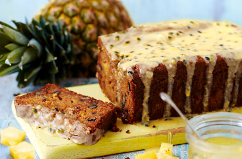 Update your favourite carrot cake with this totally tropical twist! Juicy fresh pineapple adds some moistness, walnuts give some extra crunch, while the easy passion fruit icing adds a tangy touch.