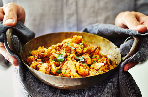 Easy Indian food is the perfect crowd pleaser for weekend family meals - and this spiced cauliflower dish is sure to impress