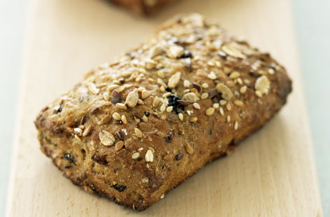 These wholemeal breadrolls with a muesli twist make a delicious snack or lunch accompaniment. Raisins are kneaded into enriched bread dough, then, after baking, the rolls are topped with crunchy sesame seeds and rolled oats.