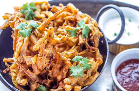 This spicy onion bhaji recipe is so easy and is the perfect vegan side dish for your next Indian. 