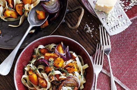 This simple but impressive pasta dish combines caramelised onions and butternut squash with crispy almonds and sweet balsamic vinegar. The bright colours swirled through tagliatelle mean it's a bit of a looker, making it a great dinner party recipe.