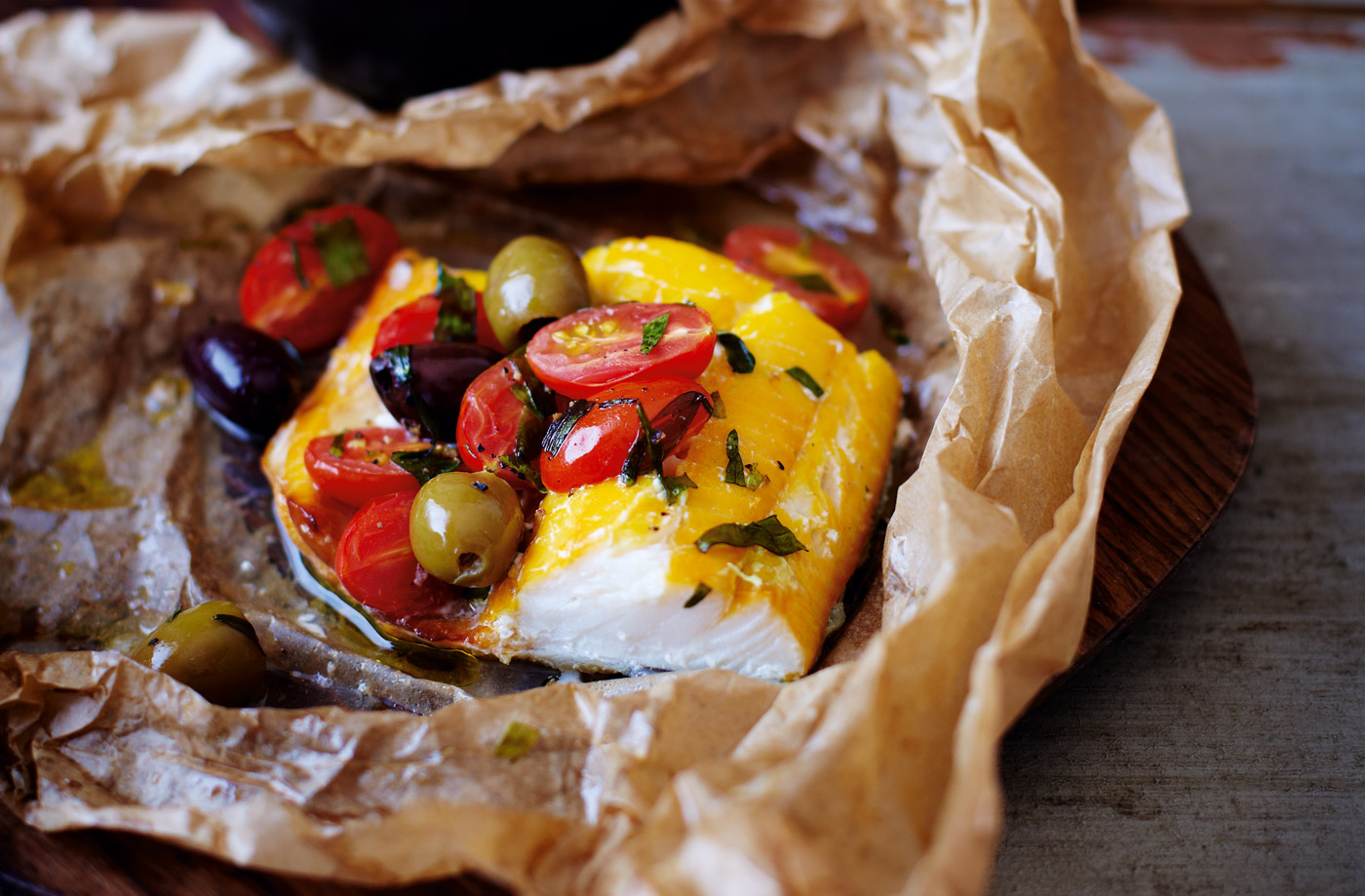Tesco Finest smoked haddock parcels with cherry tomatoes and olives recipe