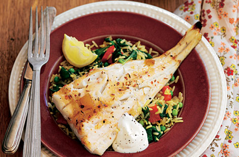 Making the most of storecupboard spices can transform dishes such as this one. A simple fish and rice dish can become something new and exciting to add to your weekly menu. Finish with a little natural yogurt or soured cream.