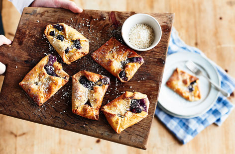 These little baked blueberry and coconut turnovers are bursting full of fruity flavours and make a delectable sweet treat